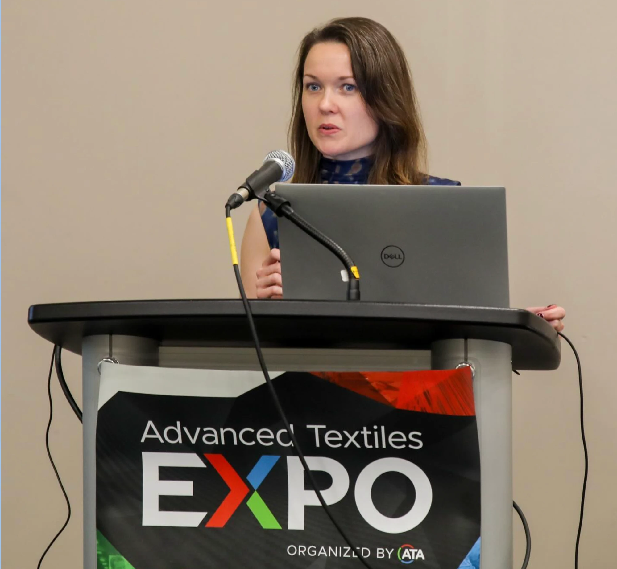Professor Holly Morris speaking at the Advanced Textiles Expo